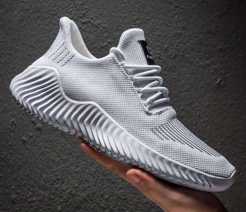 Durable men's running shoes with breathable mesh, offering ultimate comfort for long-distance training.