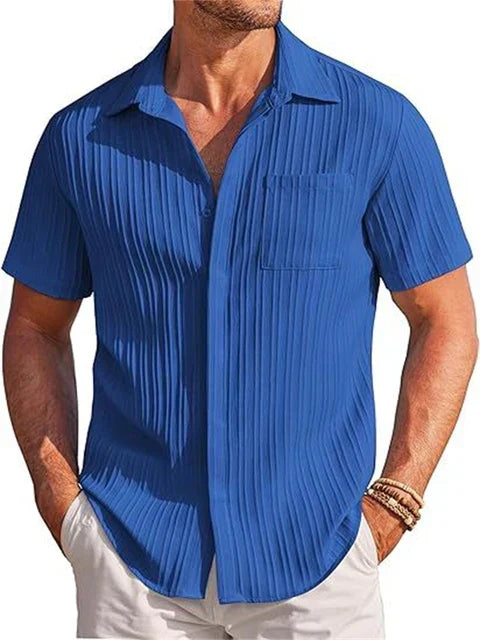 Comfortable men's summer shirt with a relaxed fit. Breathable short sleeve button down for vacation.