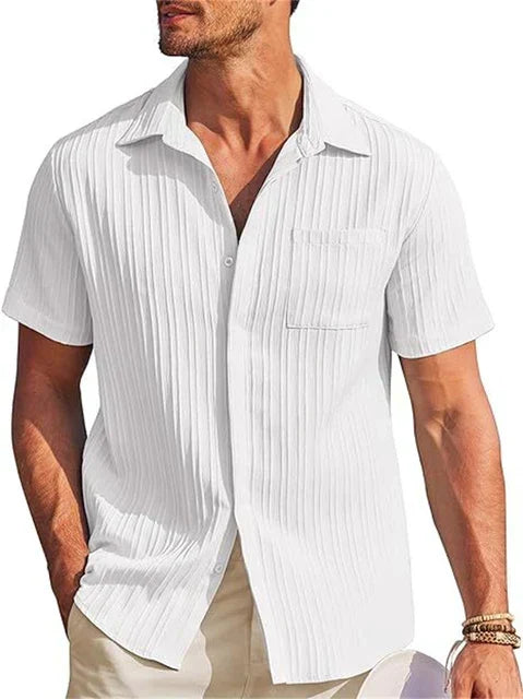 Vacation ready men's summer shirt. Breathable fabric, relaxed fit, short sleeve button down style.