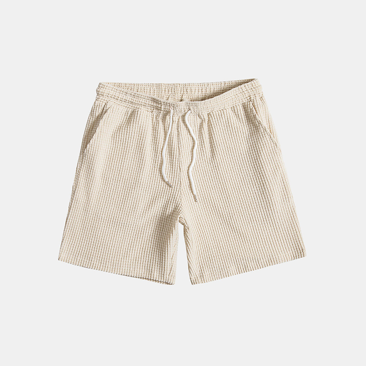 Breathable waffle knit summer outfit for men, perfect for relaxing at home or casual outings.