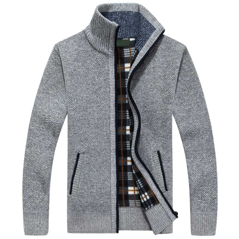 Warm men's cable knit sweater with a full zipper, perfect for cozy winter fashion and outdoor activities.