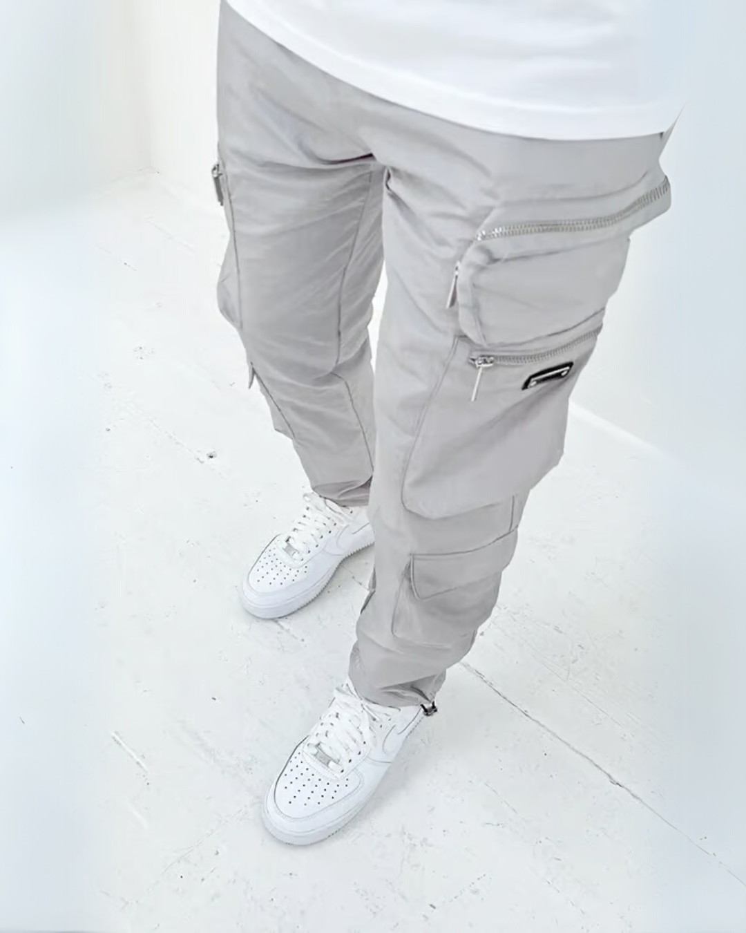 Comfortable men's cargo pants in military green, featuring large tactical pockets for functionality.