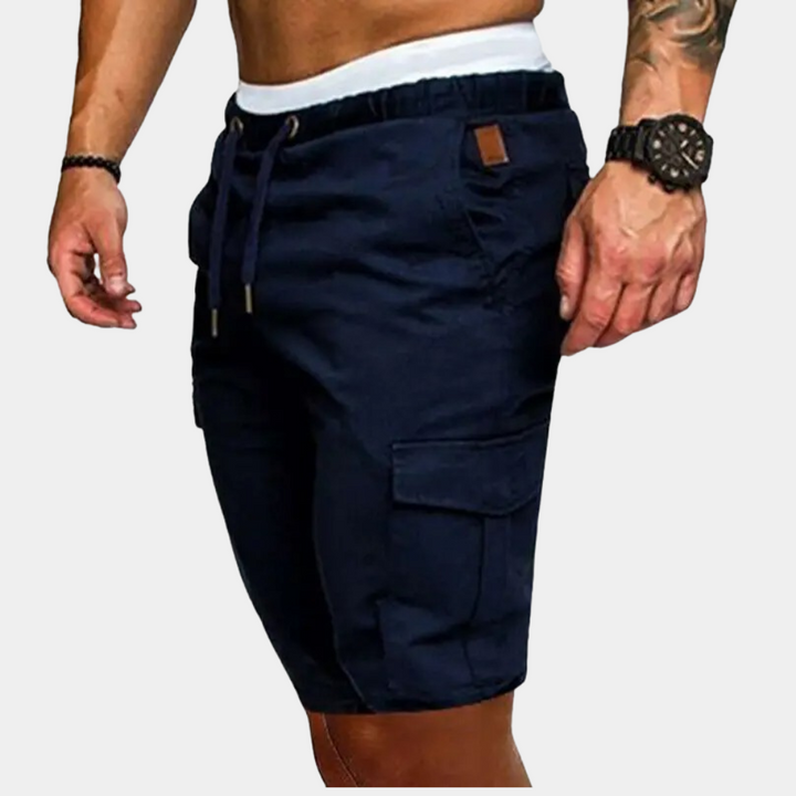 Relaxed fit men's shorts in khaki, perfect for lounging, with comfortable elastic waistband