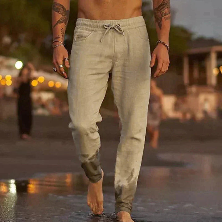 Men's casual linen trousers, lightweight & breathable for summer comfort. Ideal for beach or everyday wear.