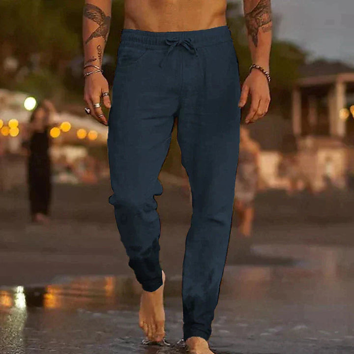 Lightweight & breathable men's linen trousers for ultimate summer comfort. Essential casual pants.
