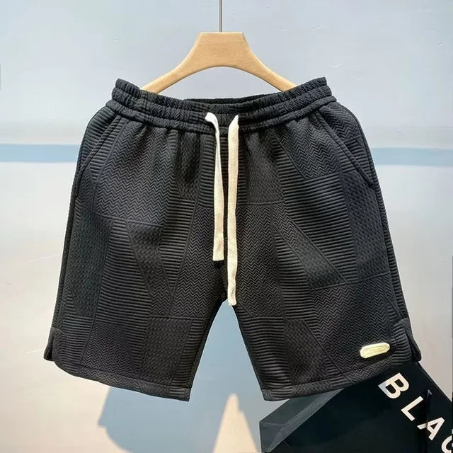 Men's comfortable gym shorts in a relaxed fit, suitable for summer and athletic pursuits