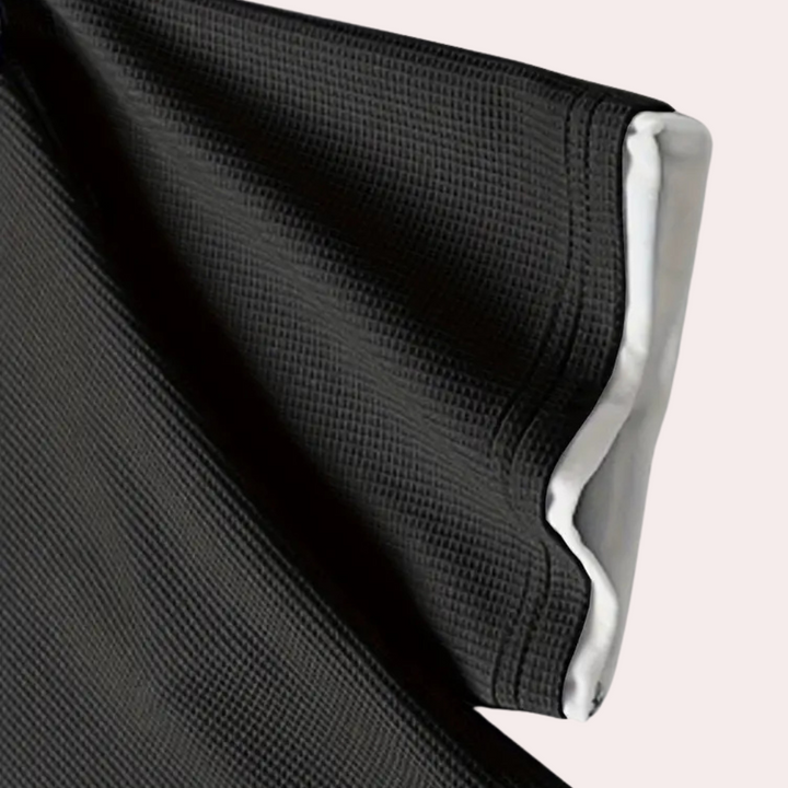 Fashionable men's summer set: casual short-sleeve shirt & shorts. Breathable and comfortable for warm days.