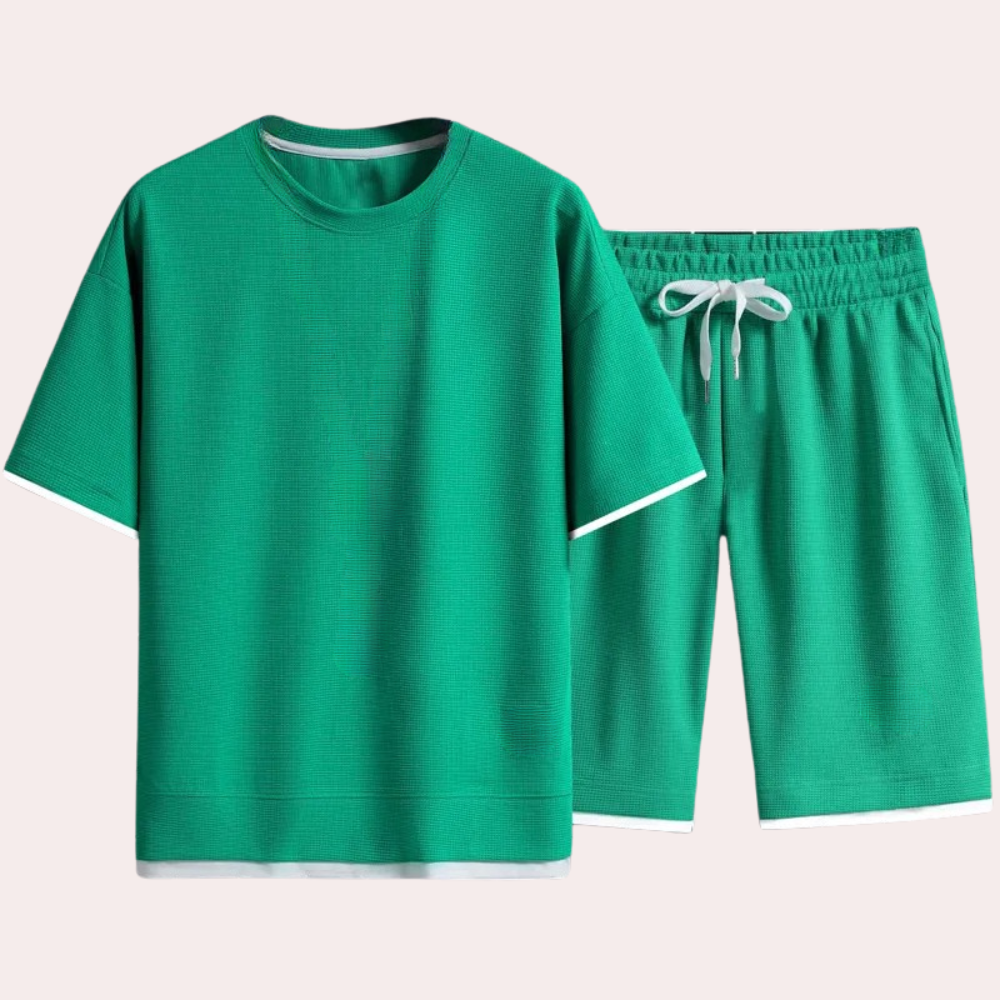 Modern men's two-piece summer set, offering a complete casual outfit with a stylish shirt and shorts.