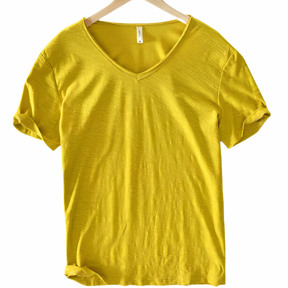 Model wearing a white men's v-neck casual t-shirt, showcasing a lightweight apparel.