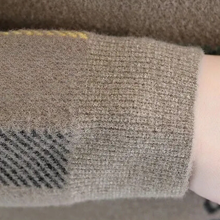 Close-up of a men's comfortable knit sweater texture, highlighting the timeless style for casual wear.