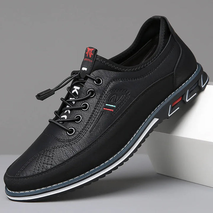 Close-up of a men's classic lace-up Oxford shoe, ideal for formal attire, business meetings, or professional office wear.