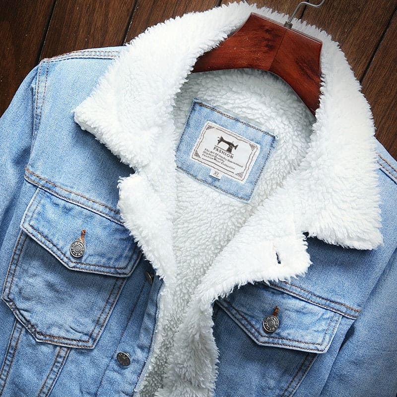 Warm men's blue denim winter jacket, providing comfort and classic style for cold days. Everyday fashion.