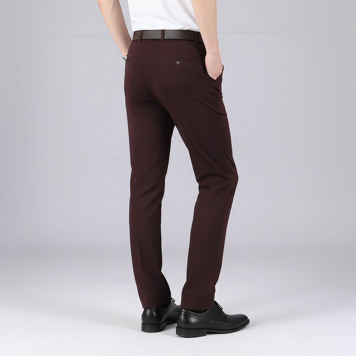 Man wearing classic stretch fit trousers, demonstrating a relaxed yet polished look