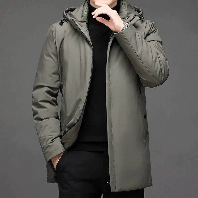 Essential men's hooded winter jacket, a classic warm outerwear choice for facing harsh cold weather.