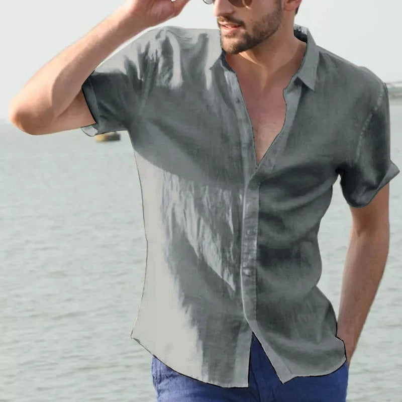 Breathable linen men's short sleeve shirt, ideal for warm weather & holiday style. Comfortable casual fit.
