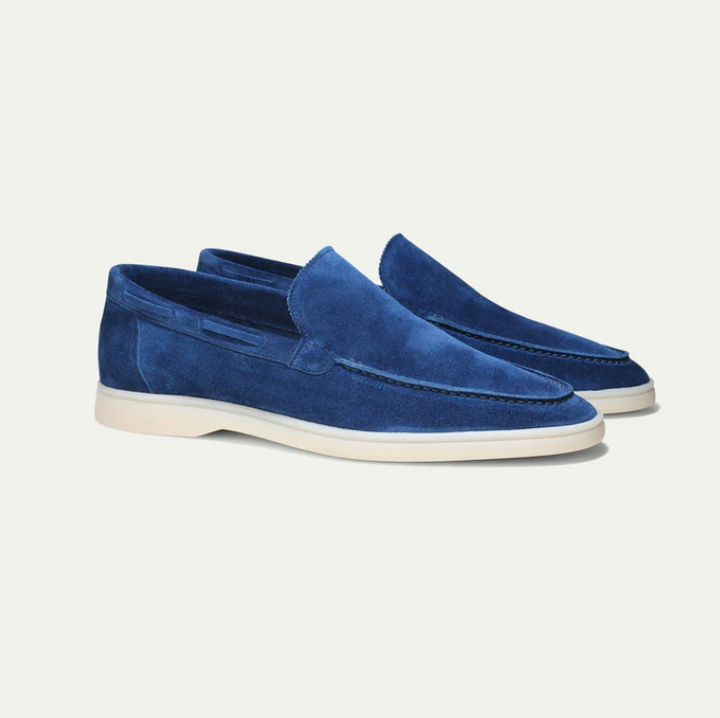 Side profile of stylish men's leather slip-on loafers, showcasing elegant design for any outfit.