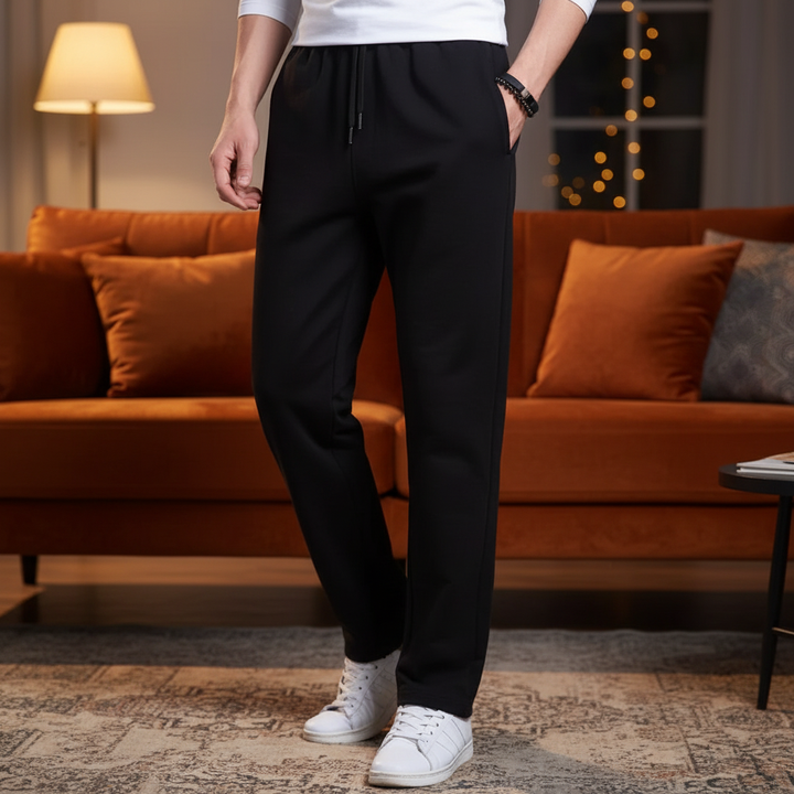 Men's comfortable athletic jogger pants in black cotton blend, perfect for casual wear & lounging.