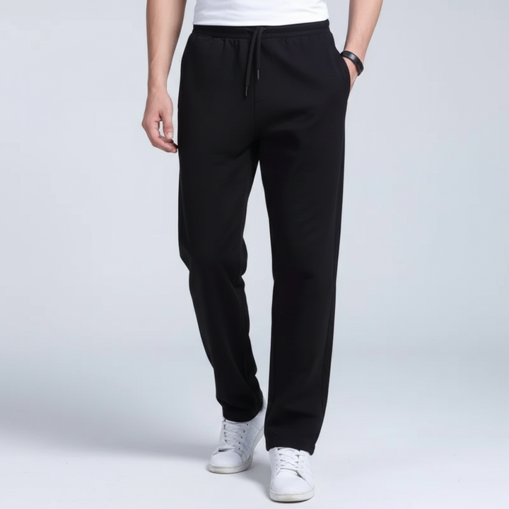 Male model wearing stylish casual men's joggers, suitable for spring athletic activities or everyday wear.