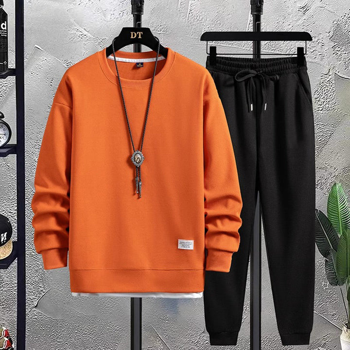 Stylish men's matching jogging suit, offering ultimate comfort for activewear, sport, or relaxed loungewear.