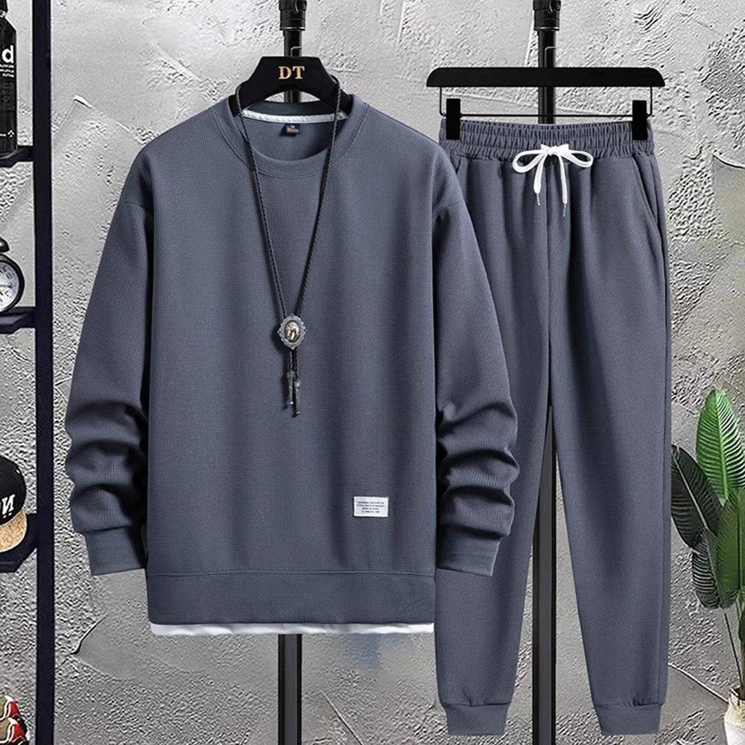 Comfortable men's activewear tracksuit set, designed for sport activities, casual wear, and ultimate relaxation.
