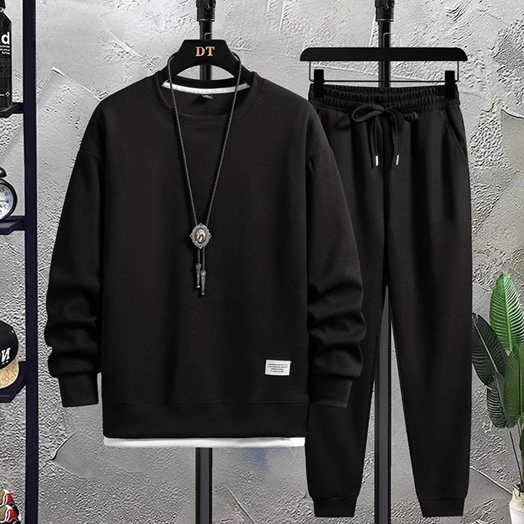 Leisure men's comfortable jogging suit for casual fashion. A stylish matching set for ultimate daily comfort.