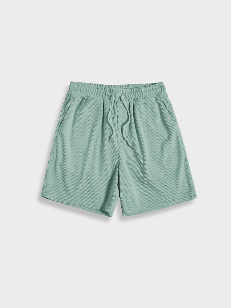 Casual men's corduroy summer outfit: short-sleeve shirt and matching shorts, perfect for warm weather.