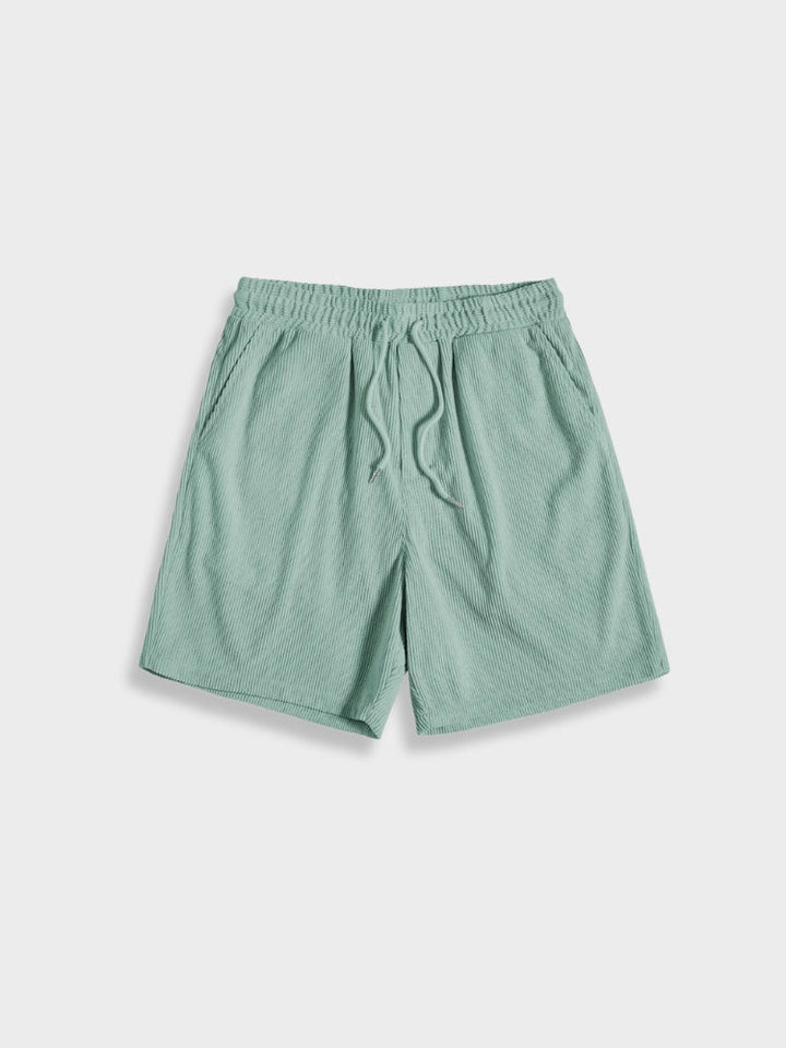 Casual men's corduroy summer outfit: short-sleeve shirt and matching shorts, perfect for warm weather.