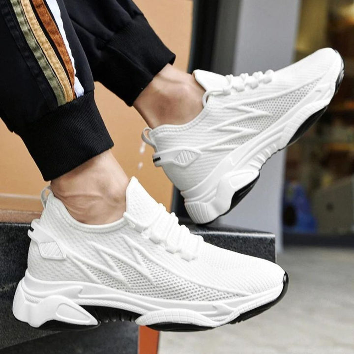 Grey casual men's sneakers. Comfort shoes with a hidden height boost for modern men's style.