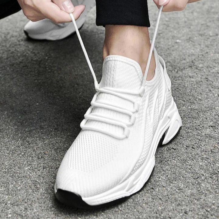 Stylish black men's elevator sneakers. Enjoy comfortable, discreet height increase in these fashion shoes.