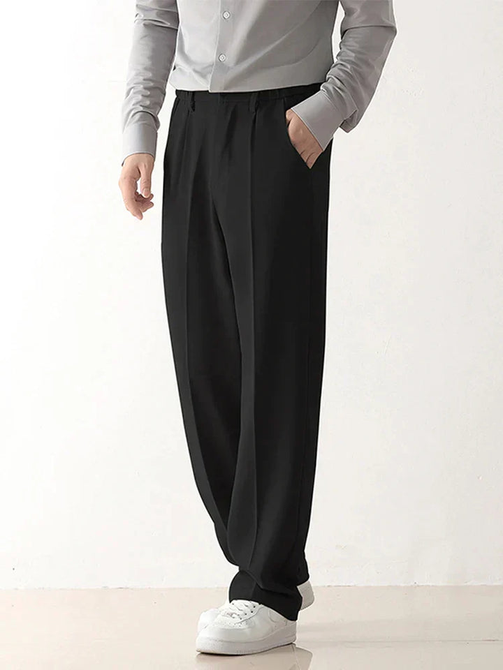 Side view of men's draped formal trousers, showcasing a comfortable fit and modern men's fashion style.