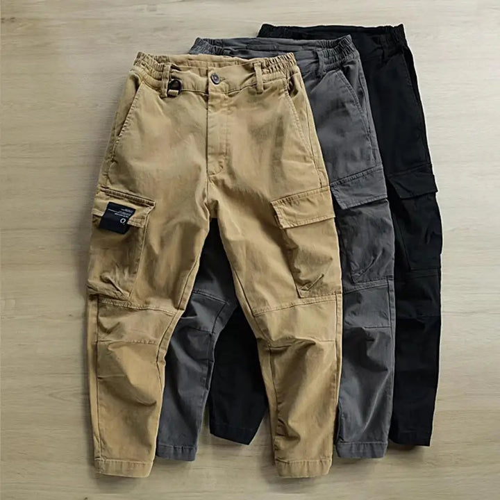 Men's durable cargo outdoor trousers, perfect for hiking, adventure, and utility.
