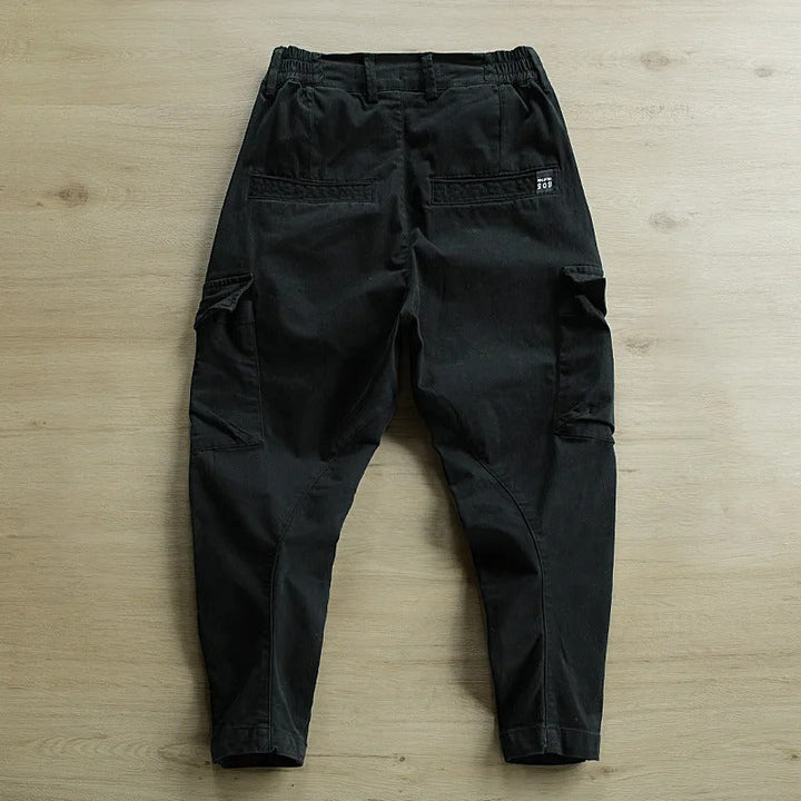 Quick-drying men's utility cargo pants, essential for active outdoor lifestyles.
