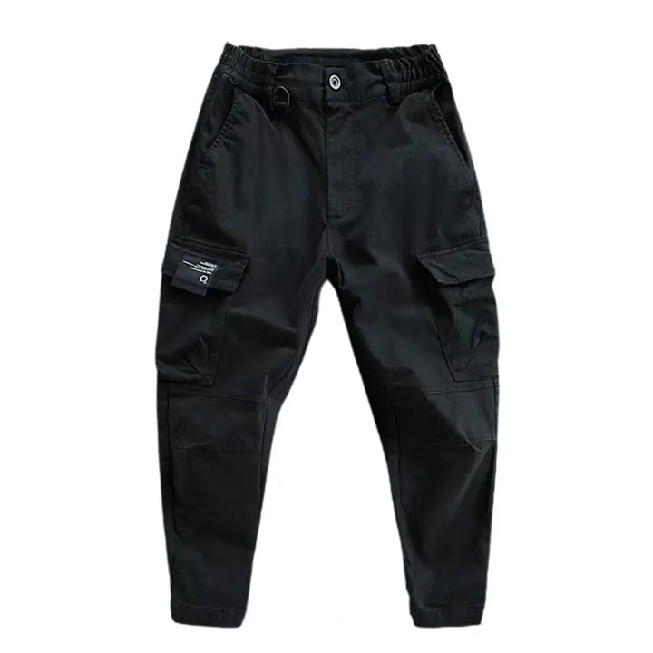 Adventure-ready men's outdoor cargo trousers, offering durability and quick-dry comfort.