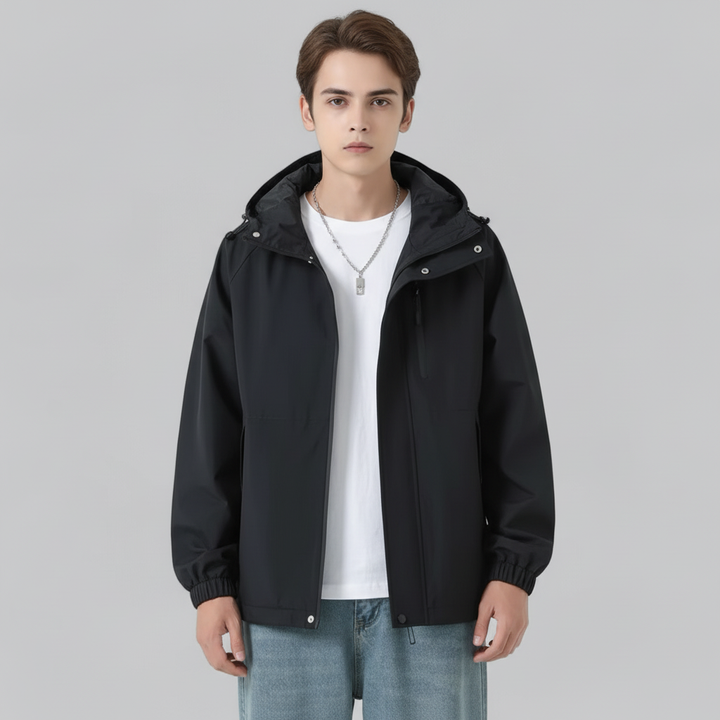 Wind-resistant men's Elia jacket in a folded position, highlighting its lightweight and packable design.