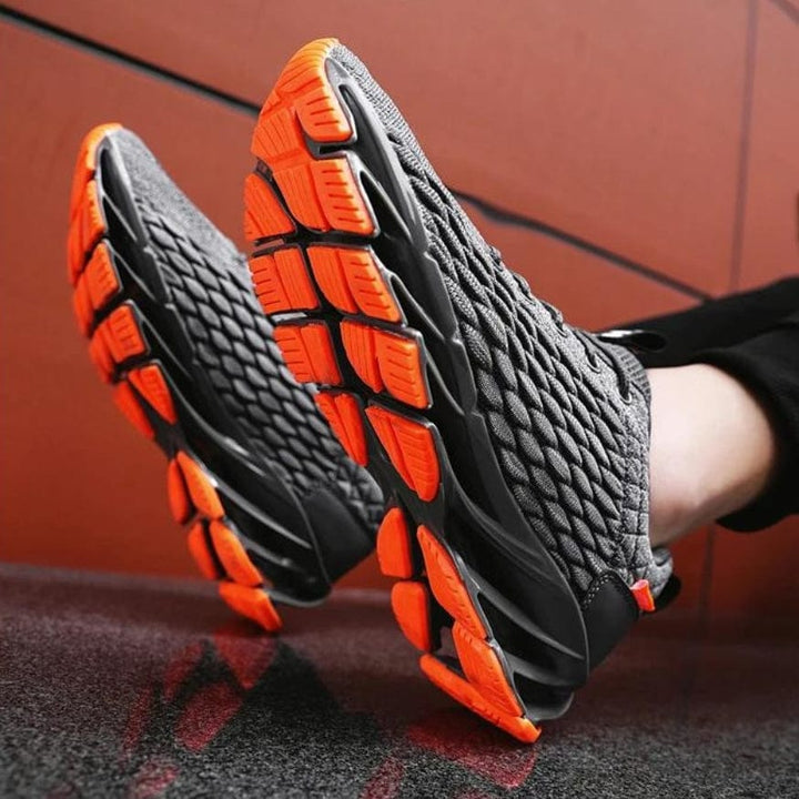 Side view of Men's Elric DynamicMotion athletic sneakers; showcasing breathable mesh design & advanced shock absorption sole.