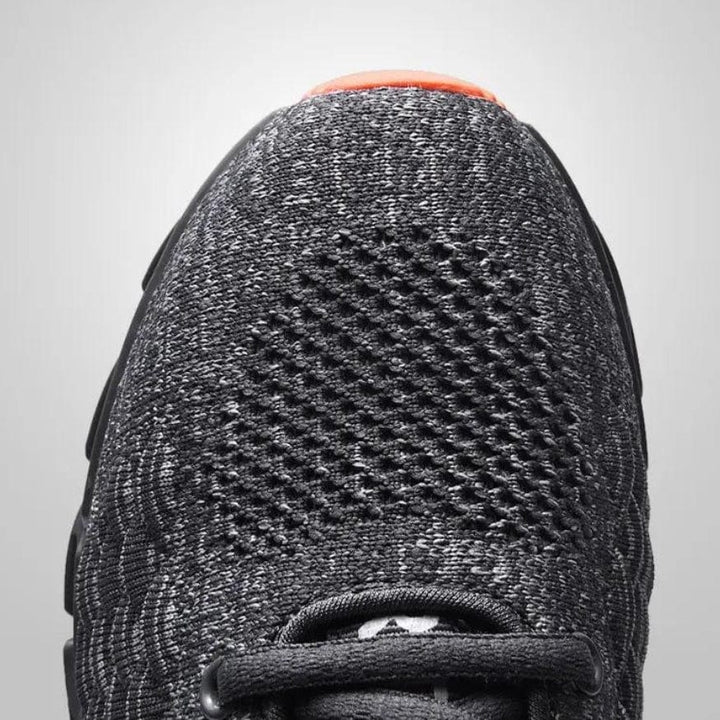 High-performance Men's DynamicMotion Elric running sneakers, engineered for comfort, breathability & shock absorption.