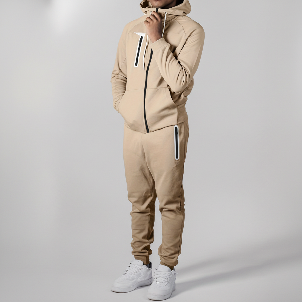 Side view of model wearing men's Eric zip-up hoodie and pants, suitable for loungewear