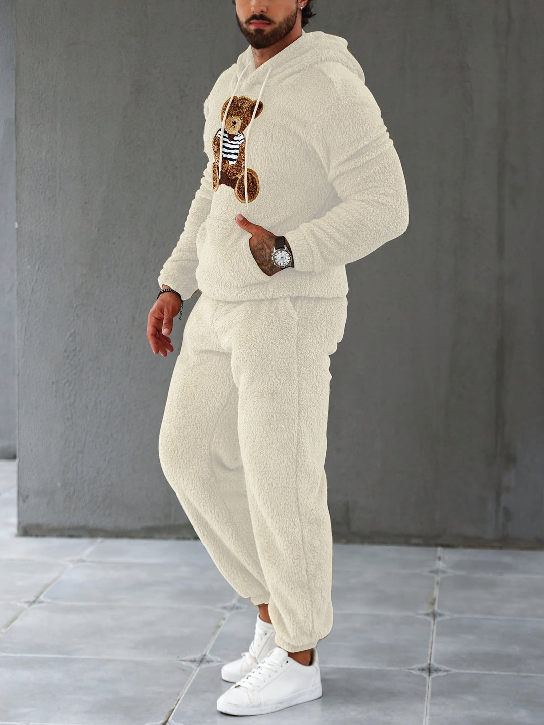Black men's fuzzy fleece hoodie with matching joggers, ideal for casual warmth & winter wear.