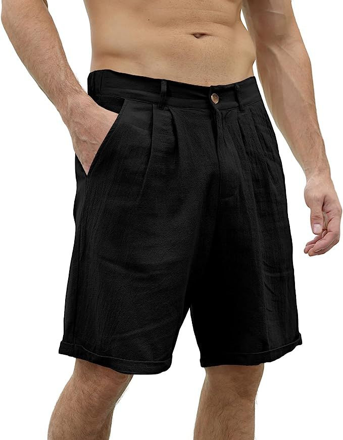 Man wearing dark blue leisure shorts with stretch, standing comfortably outdoor
