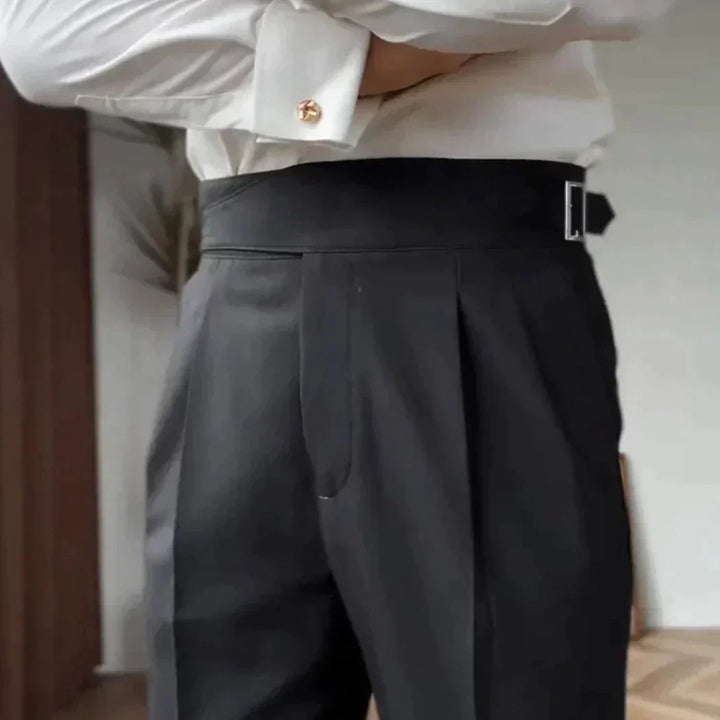 Men's tailored Gurkha pants, formal high-waisted design, shown with tucked shirt.