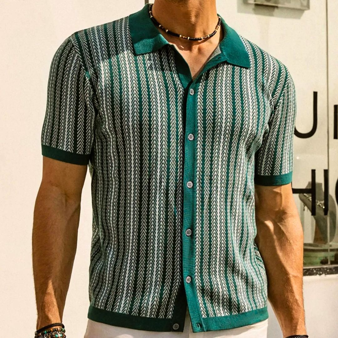 Close-up of men's modern chevron polo shirt with button placket, ideal for vacation wear & casual summer fashion.