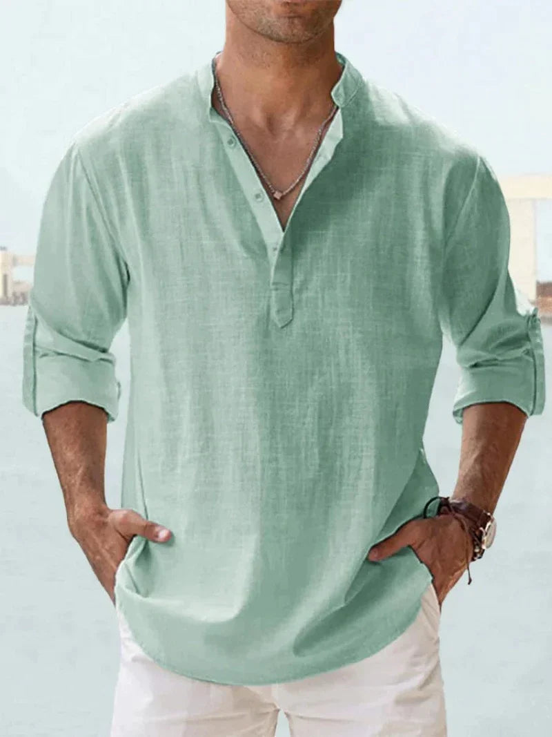 Detail of men's linen blend summer shirt buttons and collar, emphasizing quality menswear design