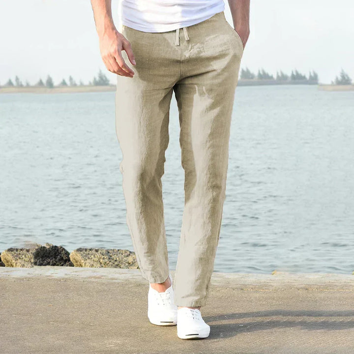 Stylish men's lightweight linen trousers, ideal for breathable summer comfort. Relaxed fit for casual spring fashion.