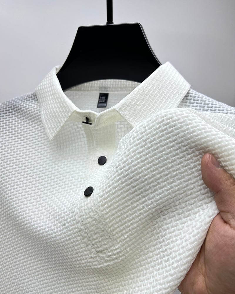 Close-up of breathable mesh fabric on a Matteo men's polo shirt, highlighting quick-dry features.