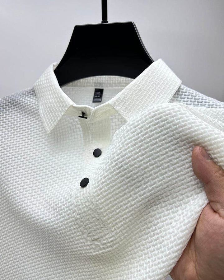 Close-up of breathable mesh fabric on a Matteo men's polo shirt, highlighting quick-dry features.