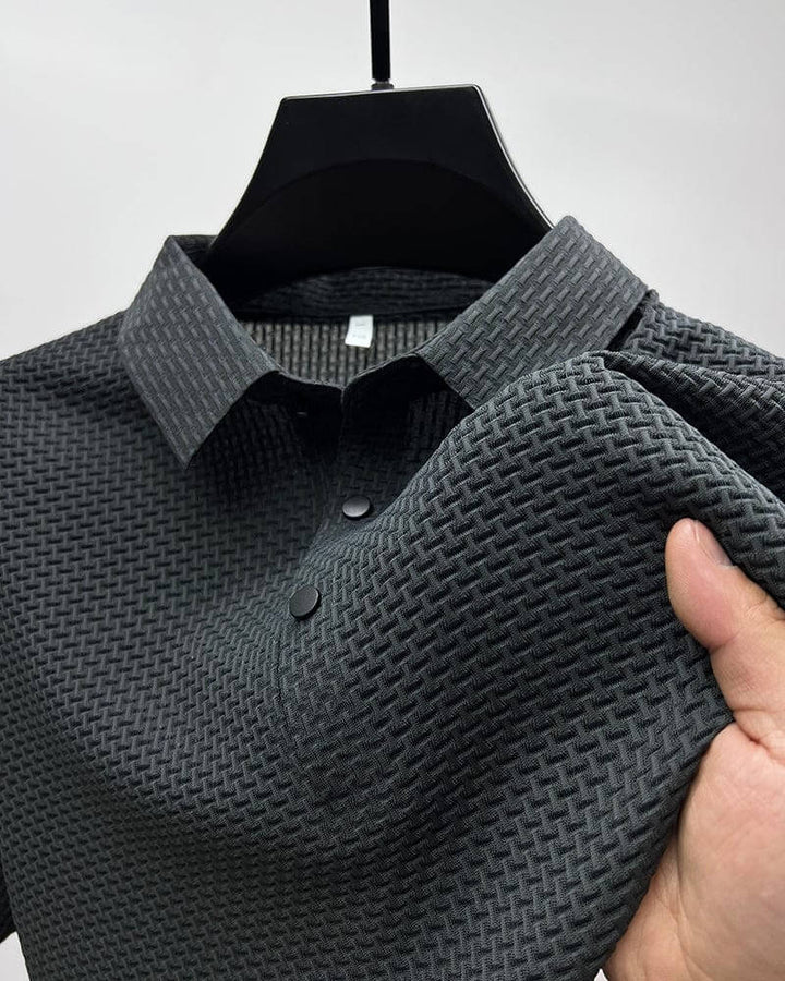 Stylish man wearing a lightweight Matteo polo shirt, perfect for casual everyday wear & comfort.