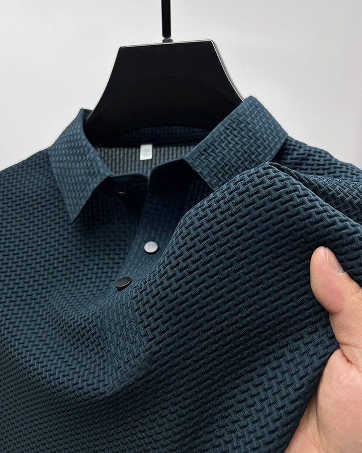 Athletic man in a breathable Matteo polo shirt, ideal for active summer days and versatile style.