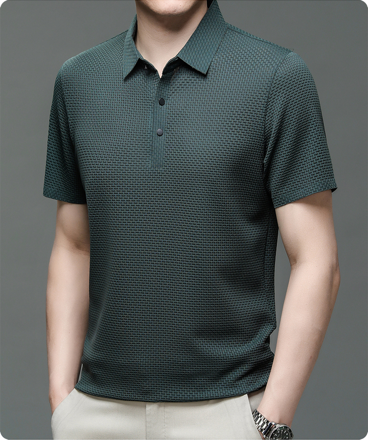 Neatly folded men's Matteo polo shirt, emphasizing its lightweight, quick-dry, and wrinkle-resistant qualities.