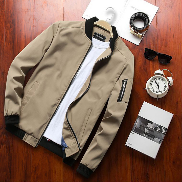 Man wearing a lightweight zip-up bomber jacket, ideal for casual summer and spring fashion.
