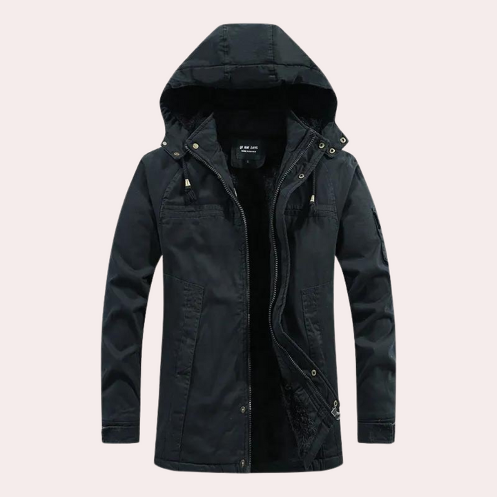 Outdoor men's Logan winter jacket, padded for warmth, with a cozy hood, perfect for active cold weather use.